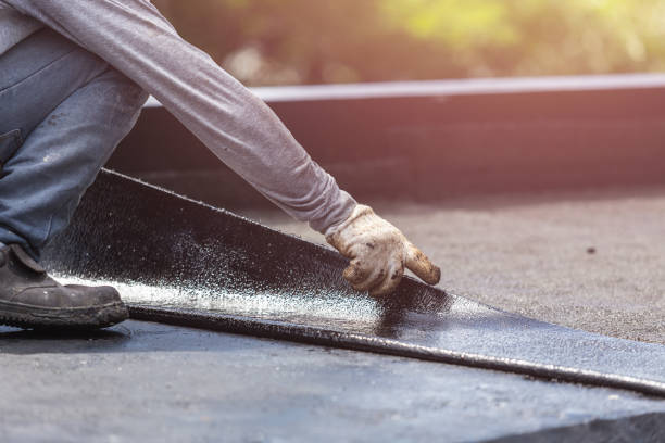 Professional Waterproofing technician working in Belford, NJ